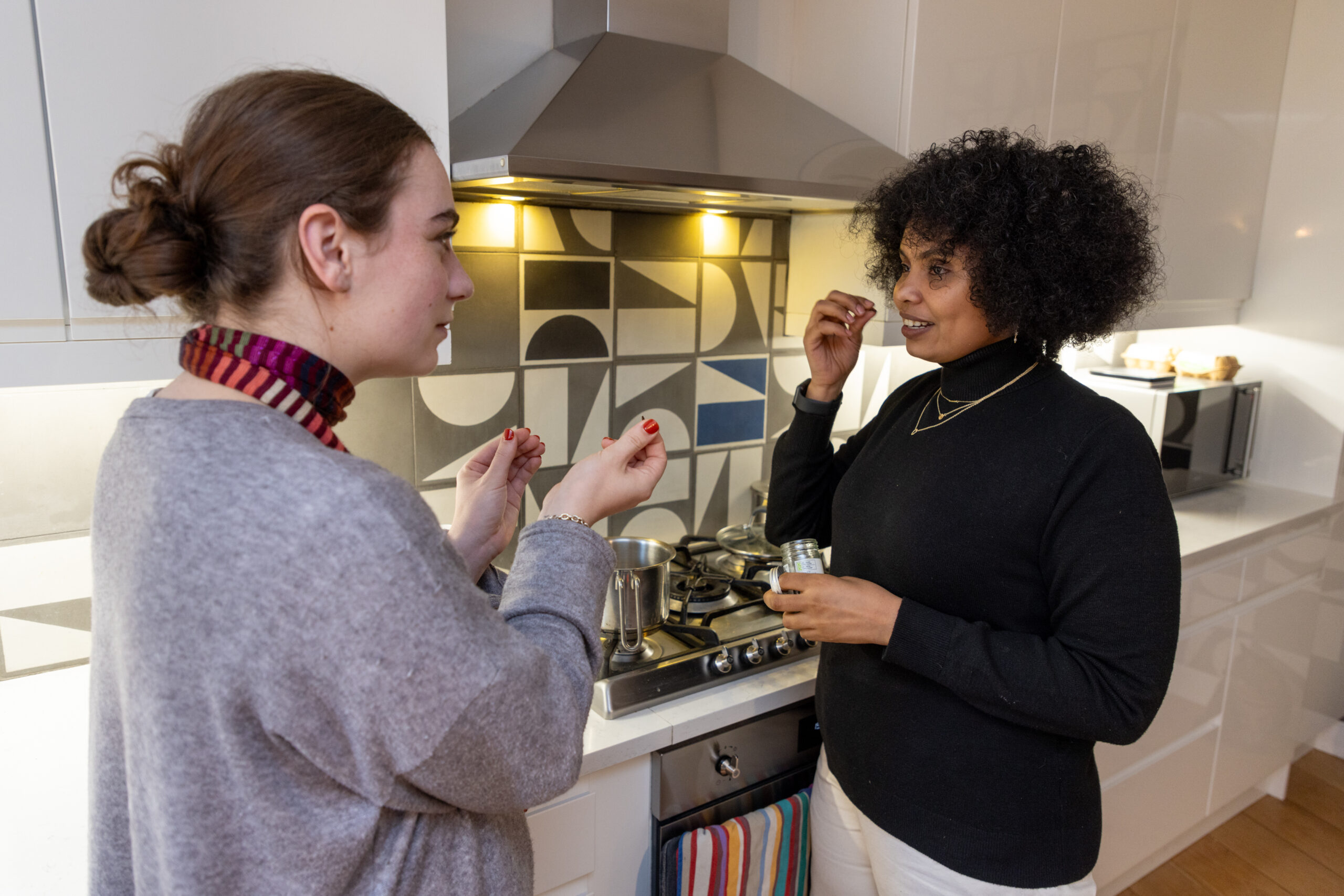 Guest and Host in kitchen